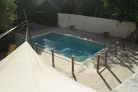 Barri�re de piscine sur mesure en Teck et verre